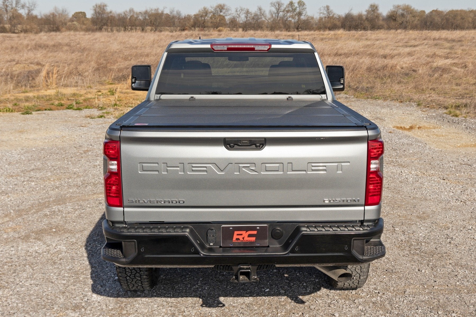 Hard Tri-Fold Flip Up Bed Cover | 6'9" Bed | Chevy/GMC Silverado/Sierra 2500HD/3500HD (20-26)