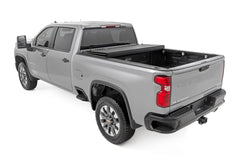Hard Tri-Fold Flip Up Bed Cover | 6'9" Bed | Chevy/GMC Silverado/Sierra 2500HD/3500HD (20-26)
