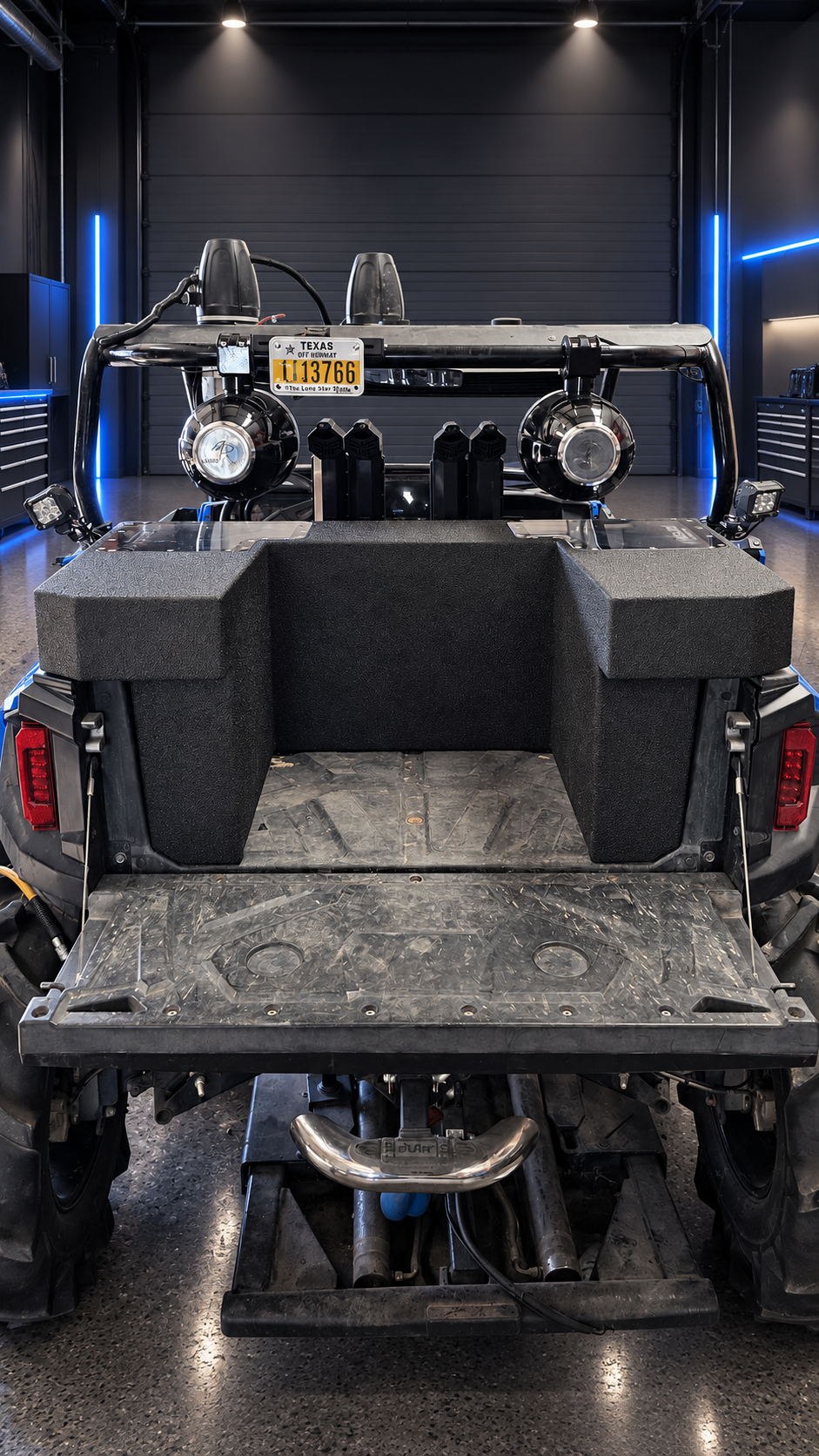 Polaris General dual 10-inch bandpass enclosure installed rear showroom view